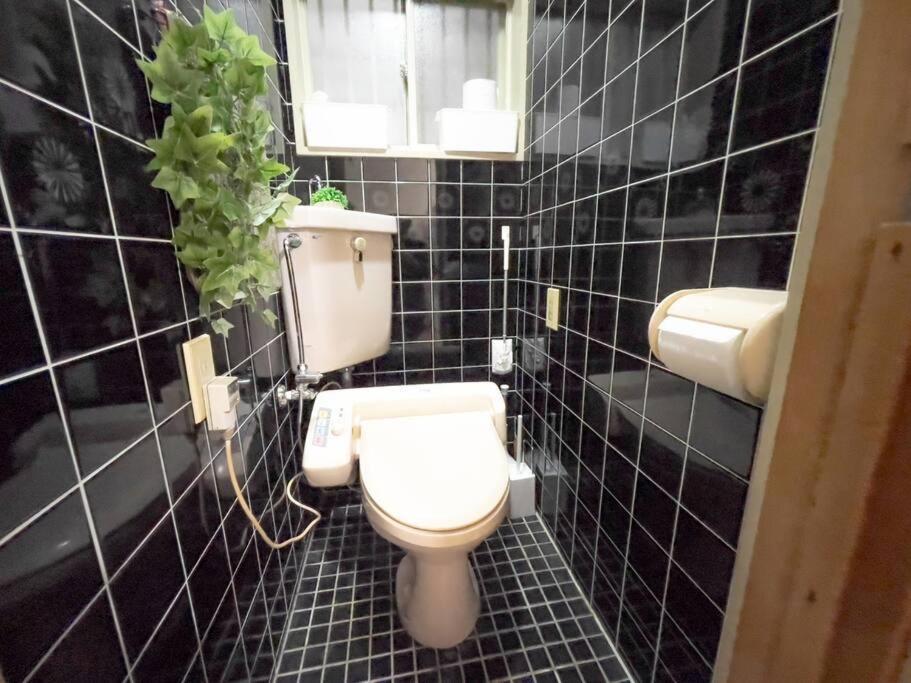団,最大16名,レンタルサイクル無料,usjまで好アクセスの3階建て โอซาก้า
