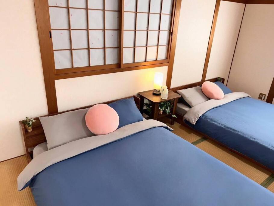 団,最大16名,レンタルサイクル無料,usjまで好アクセスの3階建て