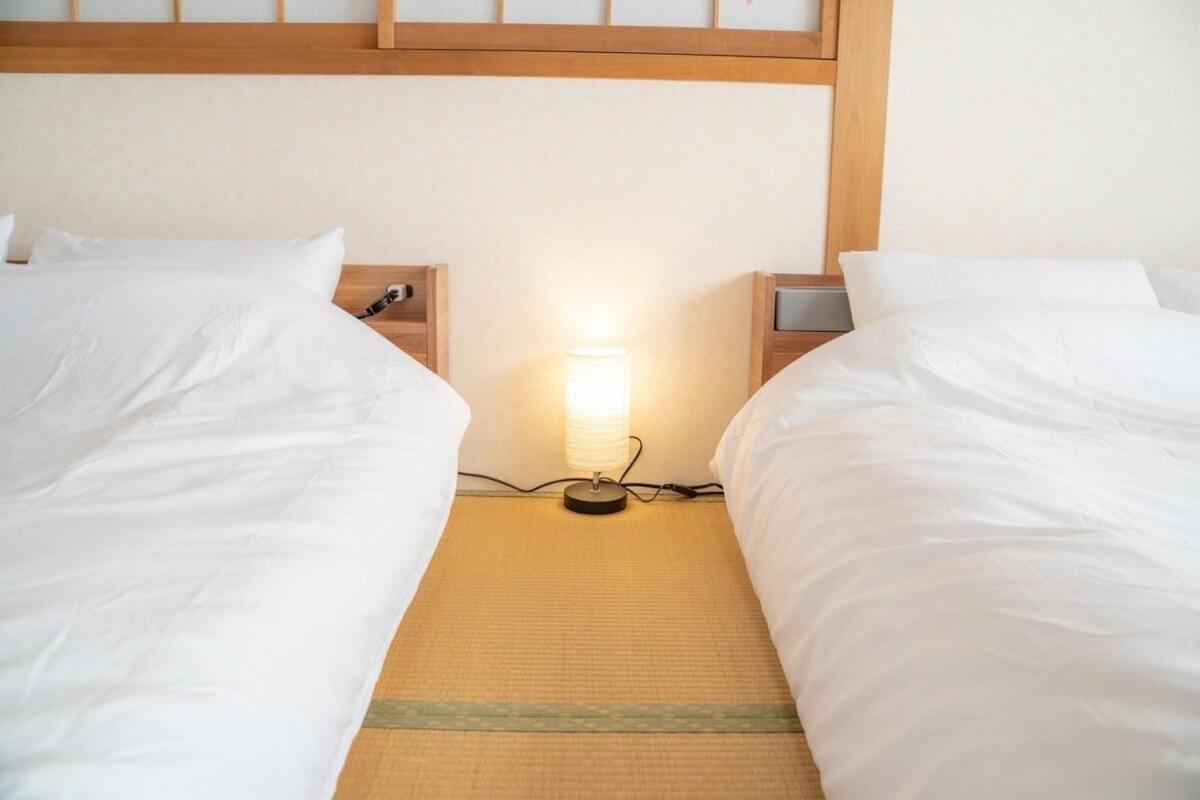団,最大16名,レンタルサイクル無料,usjまで好アクセスの3階建て